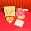 Oro Puro 999 Creativo 520 Qixi Exquisita Moneda de Oro en Forma de Corazón Set de Regalo Decoración del Día de San Valentín Personalizado Venta al por Mayor
