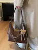 Bolso de Hombro Retro de Gamuza Escarchada para Mujer 2025 Nueva Moda Mochila de Viaje Multiusos de un Solo Hombro Cruzada