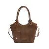 Otoño 2026 Bolso Sencillo de un Solo Hombro para Mujer Acolchado de Diamantes Estilo Cubo Nicho 2026 Bolso Cruzado de Mano Moda Retro Nuevo Estilo Inclinado