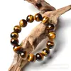 Pulsera natural de Ojo de Tigre directa de fábrica al por mayor Pulsera de piedra Ojo de Tigre joyería pulsera de gema Pulsera de piedra de madera para hombres y mujeres