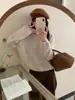 Nuevo Suéter de Punto Suave de Color Sólido con Cuello en V Estilo Coreano Otoño/Invierno 2026 Suelto Casual para Mujer