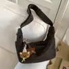 Bolsa de Axila Casual de Grande Capacidade Transfronteiriça para Mulheres 2026 Nova Bolsa de Bolinho de Inverno Alça Larga Simples Bolsa de Ombro Único Transversal