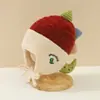 Bonitos y adorables gorros de otoño e invierno para niños, con diseño de poner, material de punto y una serie de dibujos animados, que brindan abrigo y protección para los oídos para bebés y niños pequeños.