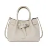 Bolsa texturizada simples e estilosa 2026 design de nicho bolsa de ombro crossbody casual bolsa de balde feminina da moda para o verão