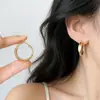 Aretes Metálicos Redondos Chapados en Oro Real de 18k Estilo Nuevo Europeo y Americano Aros Adelgazantes para la Cara Pendientes Ligeros de Lujo con Sentido de Alta Gama Accesorios de Aretes de Temperamento