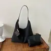 Bolso tote de gran capacidad para mujer, nueva versión coreana 2026, bolso de hombro versátil de moda de alta gama para el trabajo, retro, moderno