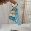 Llavero de Botella de Arena Líquida de Dibujos Animados, Pequeños Regalos para Puestos, Accesorios Acrílicos al por Mayor, Colgante Relleno de Aceite, Rasca Gatos Lindo de Regalo