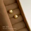 Pendientes de hierba de la suerte con microincrustaciones de circonita de moda, personalidad nicho, pendientes redondos cepillados, versátiles para el trabajo, pendientes de alta gama