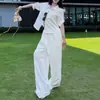 Estilo Old Money Camisa Azul con Cuello Polo de Botones Sencillos para Mujer Verano 2026 Pantalones Casuales de Corteholgado Conjunto de Dos Piezas