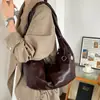 Bolso de axila para mujer 2026 nuevo de moda otoño vintage versátil de alta gama Maillard para el trabajo bandolera media luna