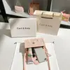 Una generación de bolso pequeño de giro 2024 nuevo bordado de alto sentido lazo bolsa cuadrada pequeña al por mayor