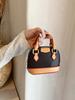 Mini bolso portátil de moda para mujer, novedad de verano 2024, bolso de concha a juego con colores contrastantes, bandolera de hombro.