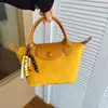 Bolsas de Alta Gama para Mujer 2025 Nuevo Estilo Simple y a la Moda Bolso Bandolera Bolso Dumpling Diseño de Nicho Versátil Bolso de Hombro Único Cruzado