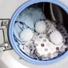 Pelota de lavandería erizo, una herramienta de limpieza para lavadoras, previene que la ropa se enrede y tiene fuertes capacidades de eliminación de manchas, diseñada específicamente para los tambores de las lavadoras