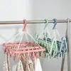 Percha de plástico creativa, multicabezal, 32 pinzas, plegable, para secar ropa interior, calcetines, pinzas para secar, resistente al viento