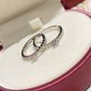 Anillo de pareja Camellia Seiko Edition con diseño de nicho de diamantes simulados de panal de abeja, estilo europeo y americano, anillo de lujo con destellos finos.