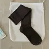 Nueva colección de principios de otoño de 2026: calcetines de algodón para mujer de color liso avena, transpirables, estilo coreano y de longitud media hasta la pantorrilla