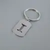 Venta Caliente de Productos Nuevos Transfronterizos 26 Letras Inglesas Huecas de Acero de Titanio Sin Decoloración Accesorios de Joyería Llavero 26 Letras