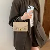 Bolso de mano para mujer 2026 nuevo moderno y elegante delicado bolso tote con forma de corazón versátil nicho bolso de hombro cruzado