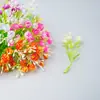 Ramo pequeño de flores artificiales de plástico accesorios de flores falsas material de decoración para tocado de crisantemo estrella DIY corsage flor de mano