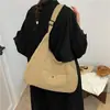Bolsa com sensação preguiçosa e relaxada para mulheres 2026 nova tendência bolsa tote de grande capacidade bolsa de ombro única para aula trajeto bolsa transversal