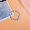 Pulsera de cuentas de arroz con flores de venta caliente transfronteriza, cuerda elástica, estilo Ins, temperamento retro, pulsera versátil, cuentas de arroz de colores