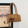 Bolso de mano retro de nicho para mujer, nueva colección otoño 2026, moderno y de alta gama, bolso de gran capacidad para el hombro para ir al trabajo