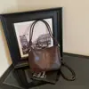 2026 Nueva Moda Coreana Estilo Minimalista de Nicho Bolso de Mano Gran Capacidad Versátil para Viajar al Trabajo Bolso de Hombro Cruzado