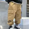 Pantalones Cargo de Moda para Niños Primavera y Otoño 2026 Nuevos Pantalones Infantiles Estilo Coreano para Niños Mayores Sueltos Casuales Largos