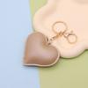 Directo de fábrica nuevo llavero de PU con forma de corazón cuero moda para mujer equipaje interior de coche colgante venta al por mayor de fábrica