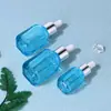 En Stock 10ml 20ml 30ml Malla Fondo Grueso Botella de Esencia Gotero de Vidrio Botella Dispensadora Cuadrada Botella de Esencia Vidrio
