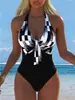 Traje de baño de una pieza para mujer estilo europeo y americano, escote en V profundo, sin tirantes, ajustado, sexy, con cutout, adelgazante, nuevo modelo 2027, adecuado para resort y aguas termales