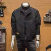 Chaqueta de trabajo para hombre de primavera y otoño con cuello alto y bolsillos grandes, chaqueta casual versátil de estilo callejero americano para hombres jóvenes