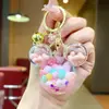 Llavero Creativo de Arena Líquida Flor de Cerezo Frijol de Leche Acrílico Infundido con Aceite Adorno Rosa Colgante para Bolso de Coche Cadena de Coche Venta al por Mayor