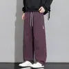 Calças funcionais impermeáveis para caminhada ao ar livre masculinas, estilo casual americano, corte solto, tamanhos grandes, versátil, calças de trabalho de perna reta