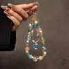Nueva Cadena para Teléfono Móvil Cadena Colgante de Cristal Diseño de Gama Alta Pequeño Nicho Sentido del Diseño Exquisito Correa Colgante de Muñeca para Mujer Accesorios para Bolsos