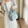 Transfronterizo 2026 Nuevo Otoño Mujer Ligero Nailon Tendencia de Moda Versátil Bolso de Hombro Cruzado Bolso de Mano para Viajes