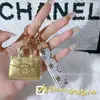 Llavero Bolsa de Oro Oro Puro 20Mg Te Garantiza Riqueza, Te Garantiza Paz, Te Garantiza Belleza, Cadena para Teléfono Móvil Decoración de Coche
