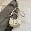 Bolso cruzado de nicho coreano para mujer, bolso de hombro casual versátil, bolso de axila simple y moderno para el día a día, bolso popular para mujer