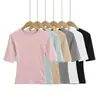 Blusa Pequena de Gola Redonda e Manga Três Quartos para o Verão Meninas Quentes Sexy Cintura Fina Emagrecimento Curta Cor Sólida Ombro Direito Emagrecimento Mangas Curtas