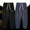 Pantalones de pana para hombre de otoño, pantalones deportivos, pantalones de chándal para hombre, holgados y versátiles, pantalones casuales de retazos, pantalones jogger, pantalones largos