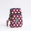 Bolsa diagonal para teléfono móvil al por mayor Nueva Bolsa pequeña para mujer Bolsa de tela para teléfono móvil bolsa vertical para cuello brazo muñeca monedero