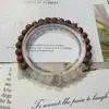 [Buscando Luz] Nuevo Estilo Chino Retro Pulsera de Costura con Patrón de Madera Simple Moda Viento Frío Ojo de Gato Penetrante Hielo Pulsera de Perlas