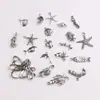 Accesorios de aleación diy colgante serie estrella de mar tortuga aretes pulsera collar accesorios una variedad de adornos de mano colgante al por mayor