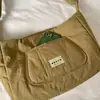 Bolso acolchado de color liso estilo coreano para mujer 2026 Otoño/Invierno Nuevo Tejido de nailon Gran capacidad Ligero para ir al trabajo Bolso de hombro único Cruzado para mujer