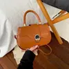 Bolso bandolera casual de color sólido retro de nicho con forma de caja 2026 Otoño gran capacidad simple textura de moda bolso de un solo hombro