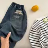 Pantalones para Niños 2026 Ojos Bizcos Otoño Nuevas Llegadas Niños y Niñas Jeans de Oso Pequeño 3D Pantalones de Zanahoria Versátiles para Bebé