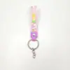 Nuevo llavero cuerda de goma blanda colgante de bolsa accesorios cuerda de cuero lindo llavero de pvc cuerda de goma blanda venta al por mayor