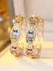 Bestseller transfronterizo: Aretes de piedras preciosas con patrón vintage dorado, aretes circulares de zircón arcoíris huecos con forma de calabaza