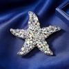Broche de estrela-do-mar de cristal cravejado de diamantes em liga europeia e americana, alfinete feminino, corsage da moda famoso na internet, acessórios transfronteiriços